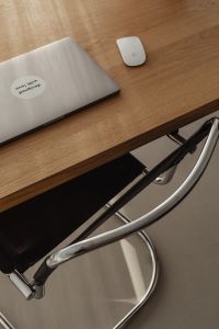 Kaboompics - Laptop and Mouse on Oak Desk with Modern Office Chair
