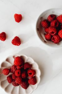 Kaboompics - Close Up Of Raspberry Bowls And Scattered Berries