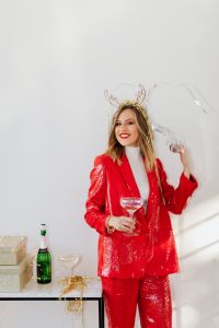 Kaboompics - Full-Length Red Suit New Year Celebration beside Party Table
