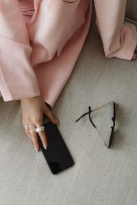 Kaboompics - Pink Suit, Smartphone and Sunglasses on a Chair