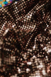 Kaboompics - Rose Gold Sequin Mesh in Soft Focus, Warm Metallic Textile Background