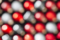 Kaboompics - Soft Focus Christmas Baubles on Dark Burgundy Textile