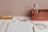 Kaboompics - White Desk with Basket and Graph Notebook