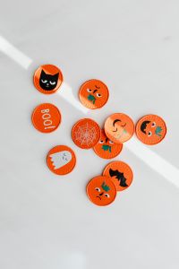 Kaboompics - Orange Halloween Buttons Flat Lay with Copy Space
