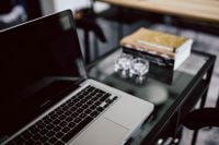 Kaboompics - Organized desk with laptop and journals