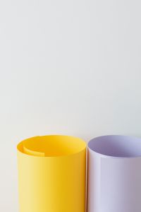 Kaboompics - Yellow and Lavender Paper Roll Openings Against White
