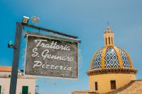 Kaboompics - Blue-Tiled Church Dome and Trattoria Sign in Praiano, Italy