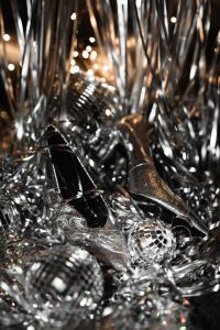 Kaboompics - Silver Glitter High Heels And Disco Balls On Tinsel