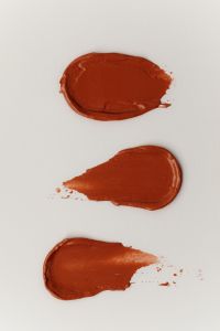 Kaboompics - Three Brown Red Lipstick Swatches