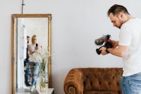 Kaboompics - Filmmaker with DSLR Camera Taking Shoots
