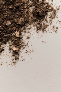 Kaboompics - Loose Dark Brown Makeup Powder on White