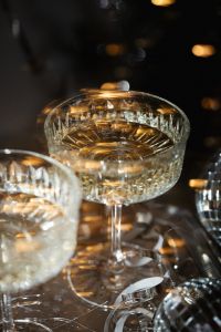 Kaboompics - Champagne Coupe and Disco Balls with Golden Bokeh