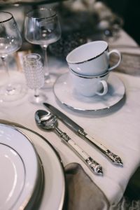 Kaboompics - Fancy restaurant dinner table decorated with quail eggs and feathers