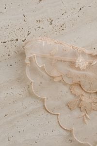 Kaboompics - Beige Lace Panties in Minimal Flat Lay
