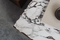 Kaboompics - Overhead Marble Table Styling with Black Ceramic Bowl and Linen Book