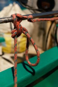 Kaboompics - Close Up of Nautical Rope Tied to Boat Railing