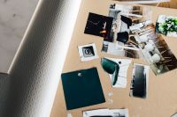 Kaboompics - Designers working with material samples and paper cutouts