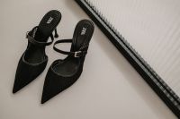 Kaboompics - Pair of Black Pointed Woven Slingback Heels