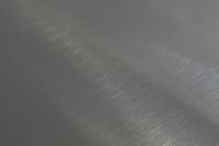 Kaboompics - Dark Gray Brushed Wall Texture with Subtle Light