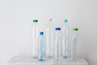 Kaboompics - Plastic Bottle Lineup on a White Marble Table