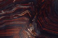 Kaboompics - Swirling Burgundy and Rust Marble Veins with Cream Mineral Lines, Naples Italy Abstract Background