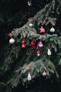 Vintage Christmas Tree Ornaments on Evergreen Branches and Snow