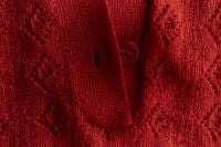Kaboompics - Red Knit Fabric With Button and Openwork Detail