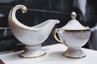 Kaboompics - White Porcelain Gravy Boat and Covered Sugar Bowl with Gold Trim