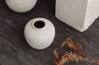 Kaboompics - White Ceramic Vases on Dark Textured Textile