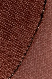 Kaboompics - Dark rust layered knit fabric with decorative stitching