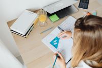 Kaboompics - Overhead View of Geometry Homework with Laptop