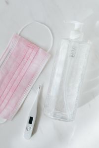 Kaboompics - Close-Up of Face Mask, Thermometer and Sanitizer Pump