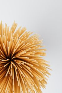 Kaboompics - Spaghetti Strands Sweeping from the Left with Copy Space for Food Layouts