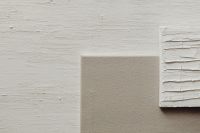 Kaboompics - White Brush-Stroke Paint Samples on Textured Neutral Boards