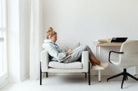 Kaboompics - Teenage Girl Studying at Home in Armchair