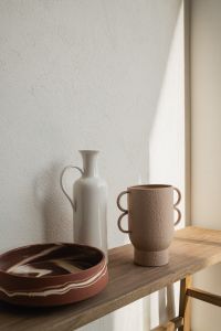 Kaboompics - Ceramic Bowl, Vase and Sculptural Mug on Wooden Bench in Sunlight