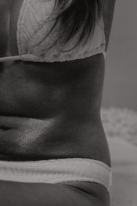 Kaboompics - Black and White Swimwear Close-Up with Sun-Kissed Skin Texture