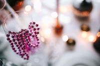 Kaboompics - Close-Up Pink Christmas Garland on Glass with Copy Space