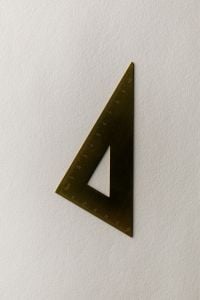 Kaboompics - Minimalist Triangular Ruler on White Background
