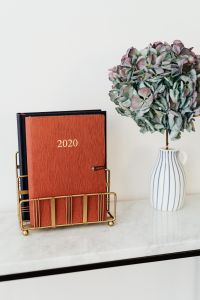 Kaboompics - Planner on The White Marble Table, White Background, HYDRANGEA