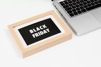 Kaboompics - Close-Up Black Friday Sign and Laptop on White Desk