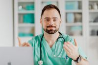 Kaboompics - Doctor Gesturing With Both Hands During Conversation