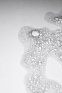 Kaboompics - Oversized White Bubble Surrounded by Fine Cosmetic Foam, Abstract Macro Pattern