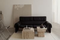Kaboompics - Black Leather De Sede Sofa with Travertine Coffee Tables