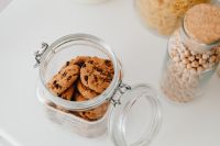 Kaboompics - Top-Down View of Chocolate Chip Cookies and Chickpeas Stored in Glass Jars