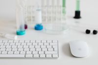 Kaboompics - Laboratory Test Tubes Beside a Computer Keyboard