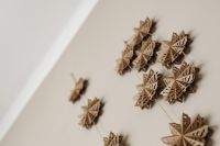 Kaboompics - Wall Garland of Wooden Snowflake Ornaments