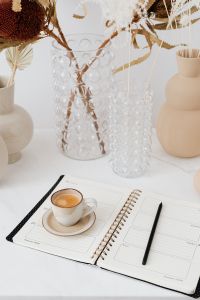 Kaboompics - Coffee - Weekly Planner & Vase on Marble