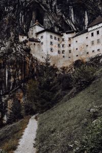 Kaboompics - Predjama castle at the cave mouth in Postojna, Slovenia