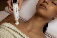 Kaboompics - Skincare Device Used on Woman's Neck and Chest